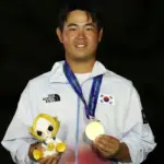 Tampil Tenang Berkat Tiger Woods, Tom Kim Raih Emas di Asian Games